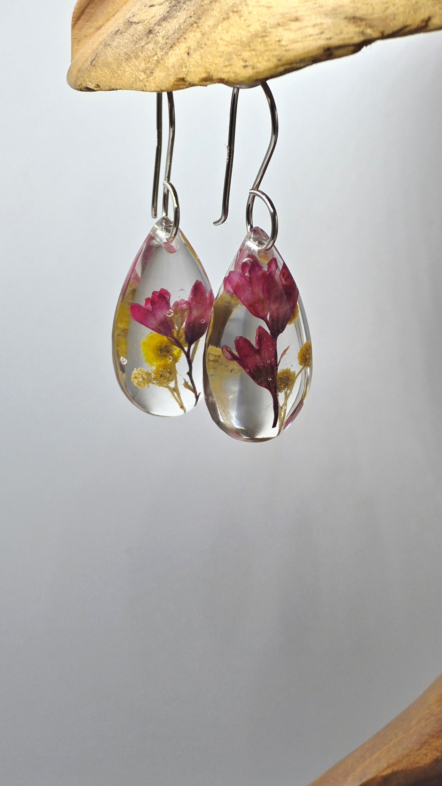 Earrings featuring wildflower specimens of Preserved Coral Bells & Wattle, secured on a .925 Sterling Silver Hook