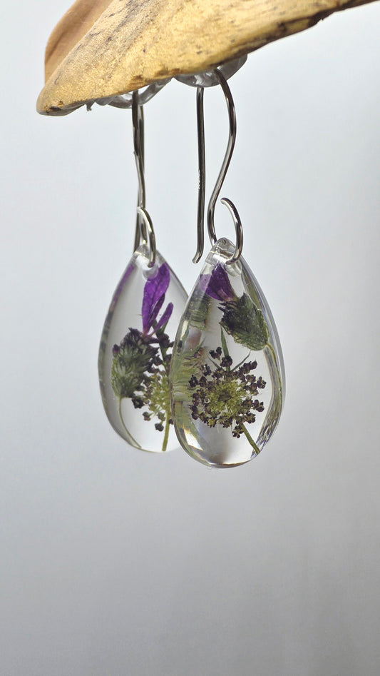 Earrings featuring wildflower specimens of Preserved Lavender & Chocolate Queen Anne's Lace, secured on a .925 Sterling Silver Hook