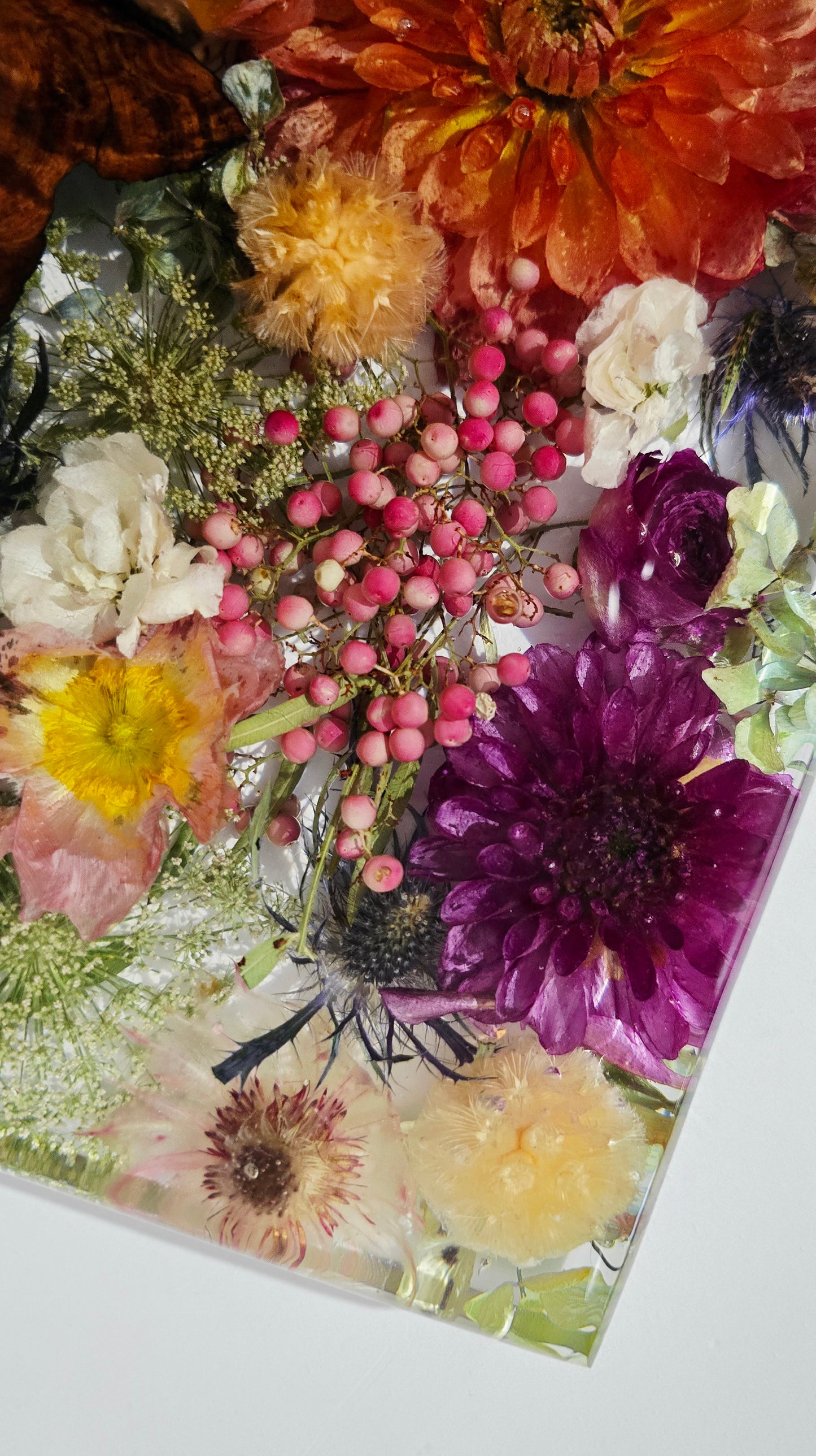 Flower Board featuring Dahlias, Peppercorn, Poppies, Scabiosa, Sea Holly, Hydrangea, Blushing Bride and Queen Anne's Lace set in Resin with Timber