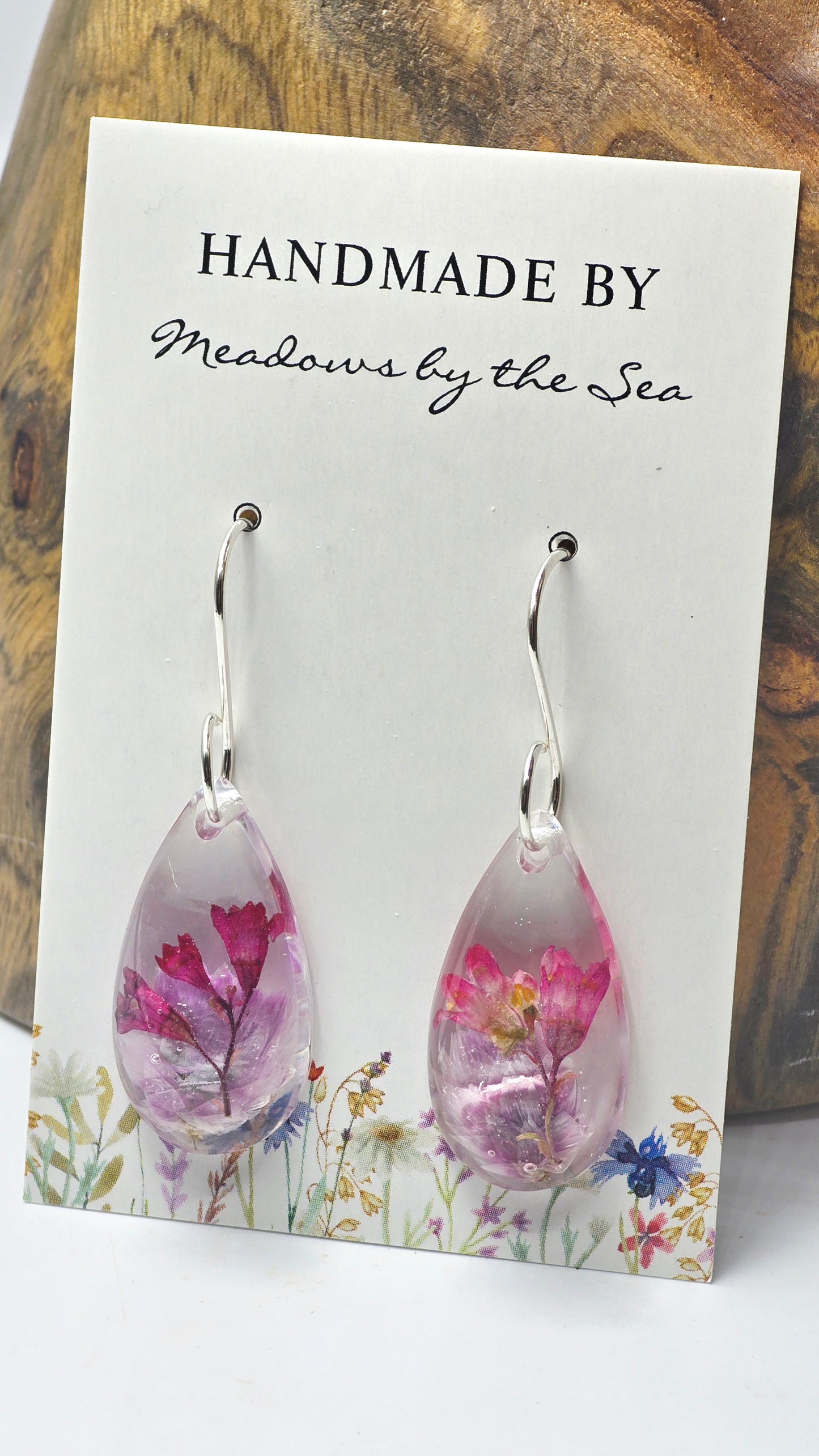 Earrings featuring wildflower specimens of Preserved Rhodanthe & Coral Bells, secured on a .925 Sterling Silver Hook