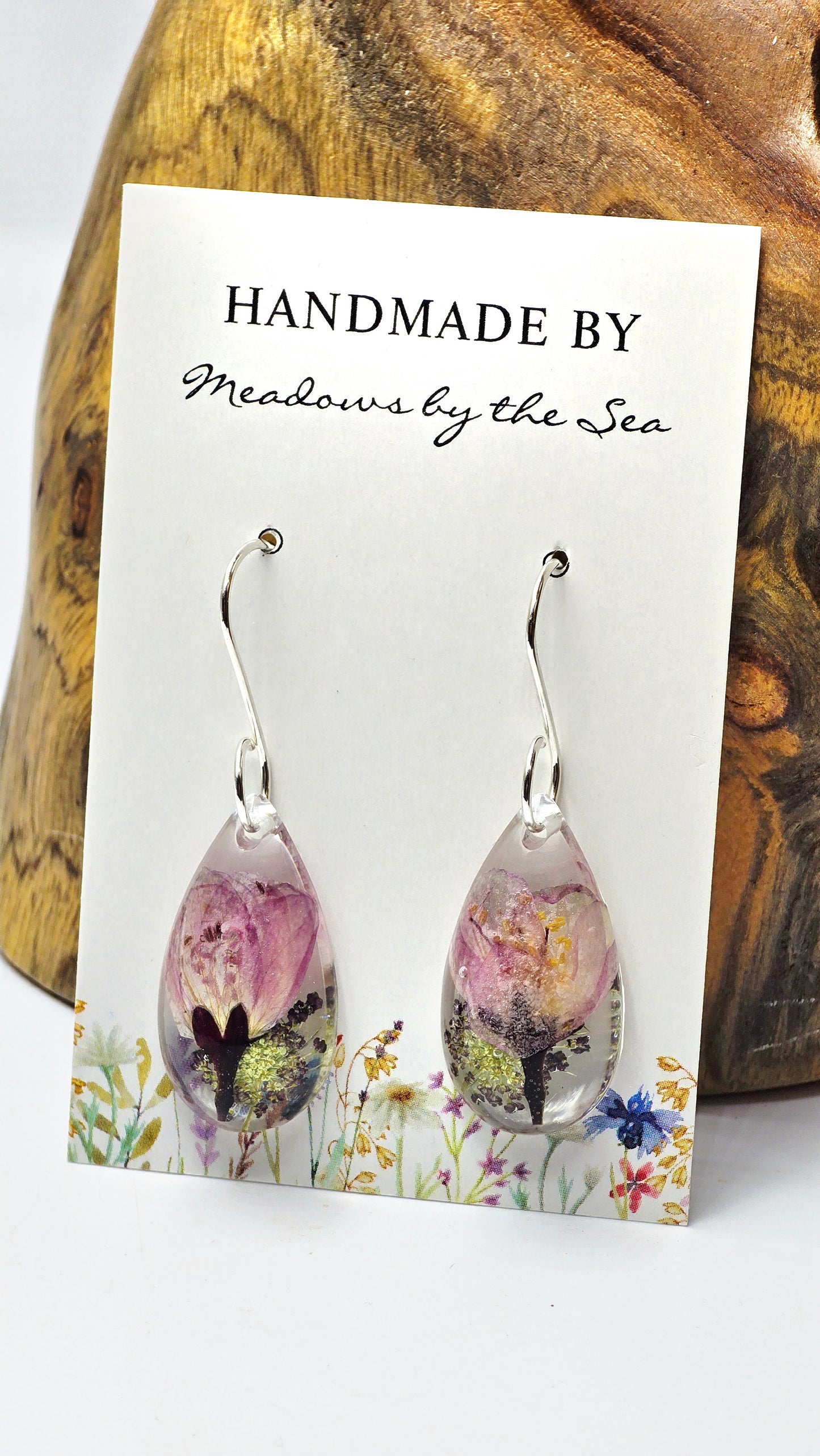 Earrings featuring wildflower specimens of Preserved Begonia & Chocolate Queen Anne's Lace, secured on a .925 Sterling Silver Hook
