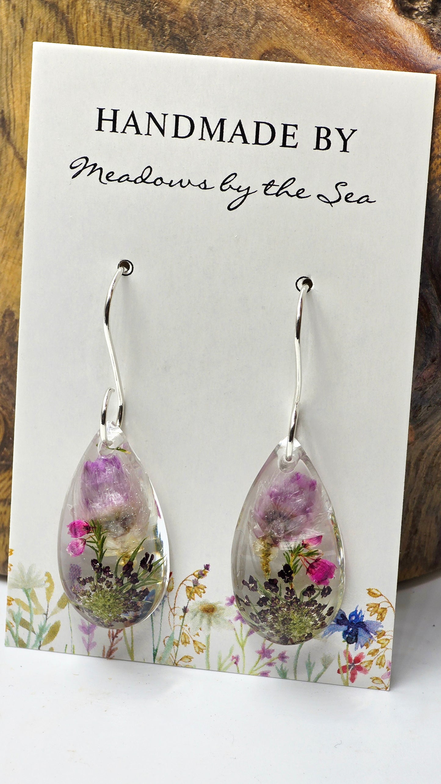 Earrings featuring wildflower specimens of Preserved Rhodanthe, Heather & Chocolate Queen Annes Lace secured on a .925 Sterling Silver Hook