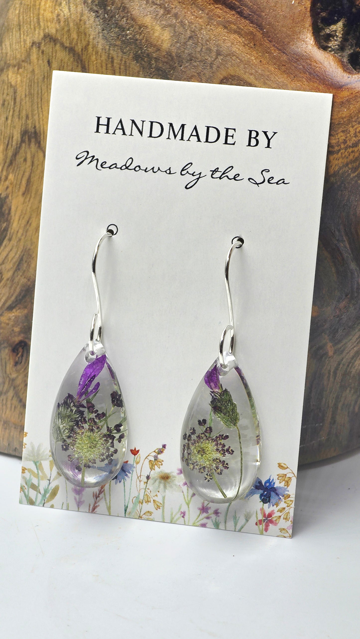Earrings featuring wildflower specimens of Preserved Lavender & Chocolate Queen Anne's Lace, secured on a .925 Sterling Silver Hook